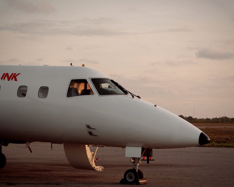 Private jet nose at golden hour sunset