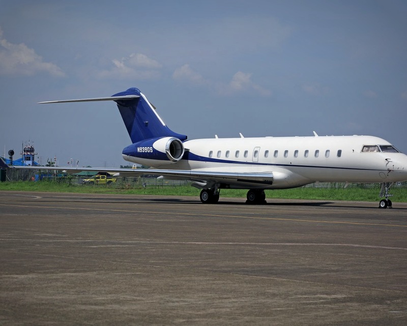 Bombardier Challenger blue tail on tarmac