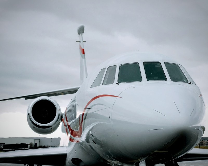 Dassault Falcon jet dramatic head-on view
